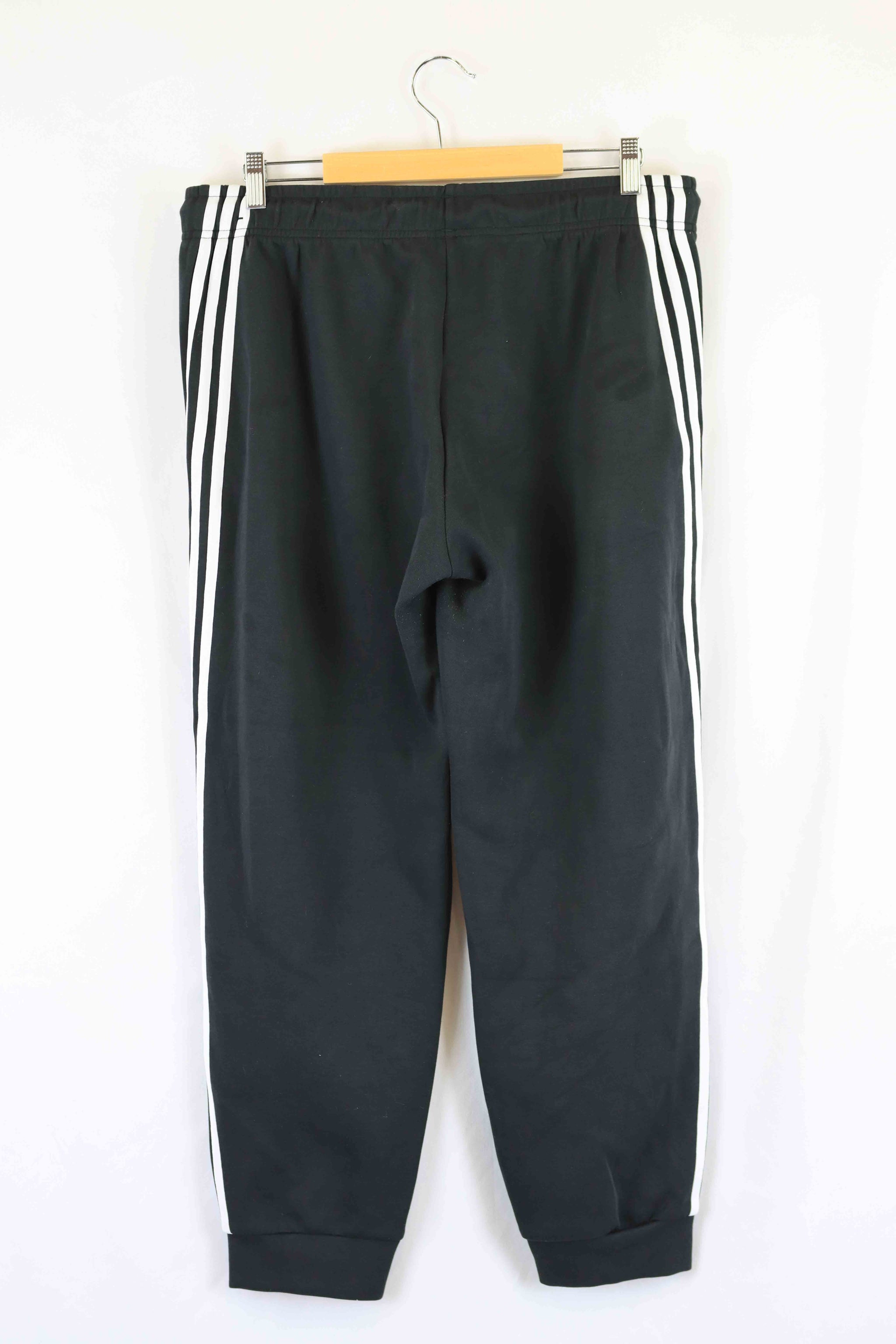 Adidas black and sales white striped pants