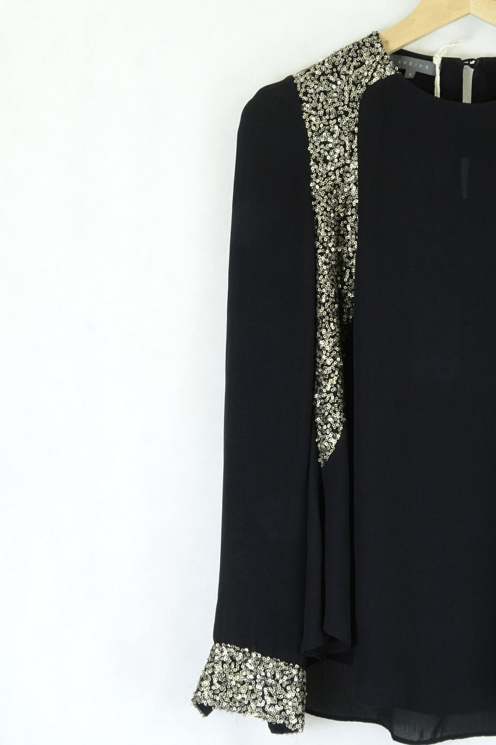 Sheike black top with gold detailing 8