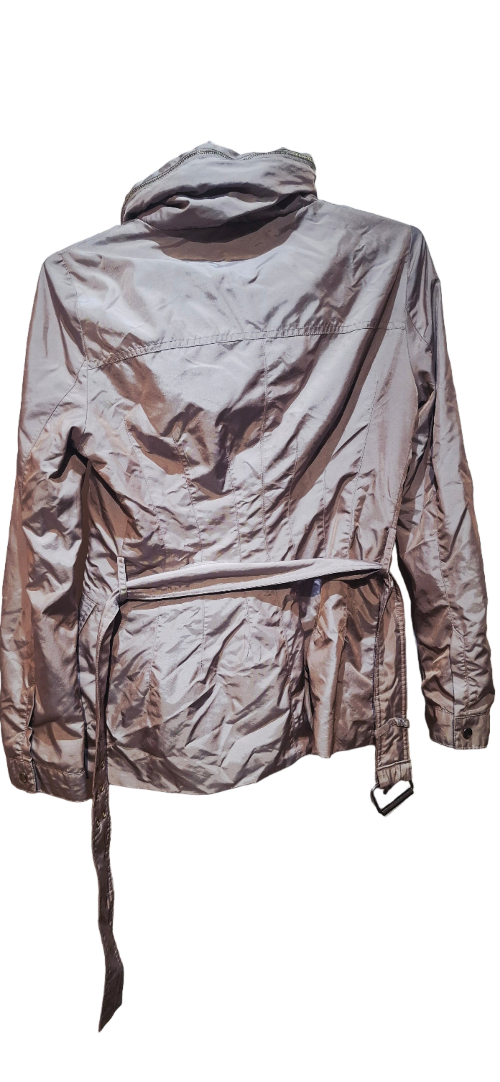 Light-colored jacket with a brown collar on a hanger against a dark background